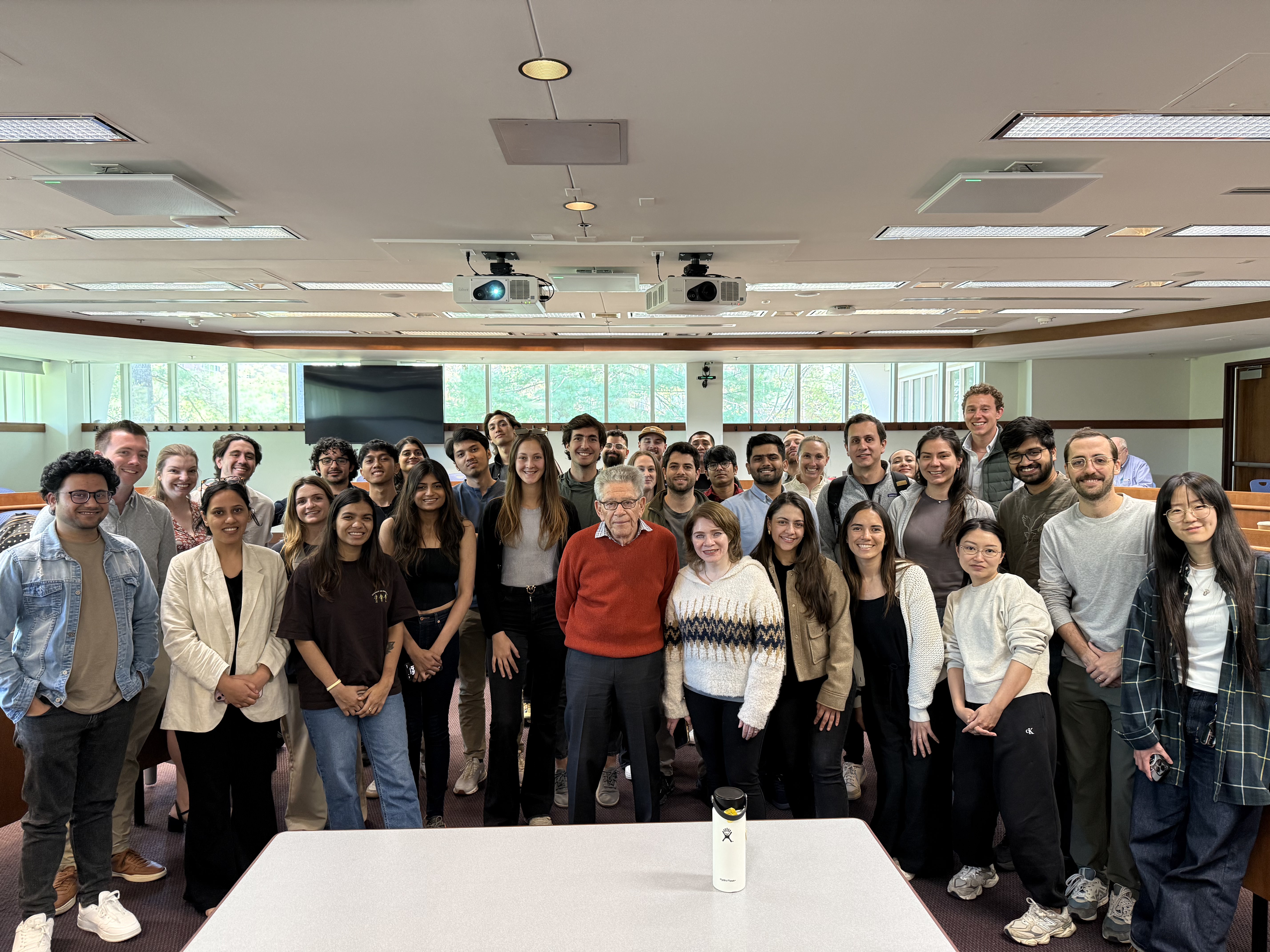 Large class group photo with a guest speaker at Babson College